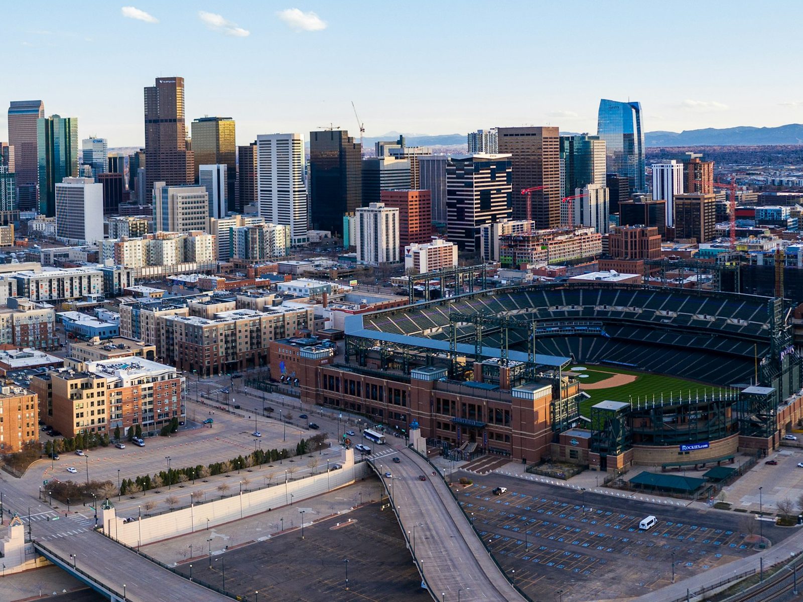 Downtown Denver from the air, the Front Range along the horizon